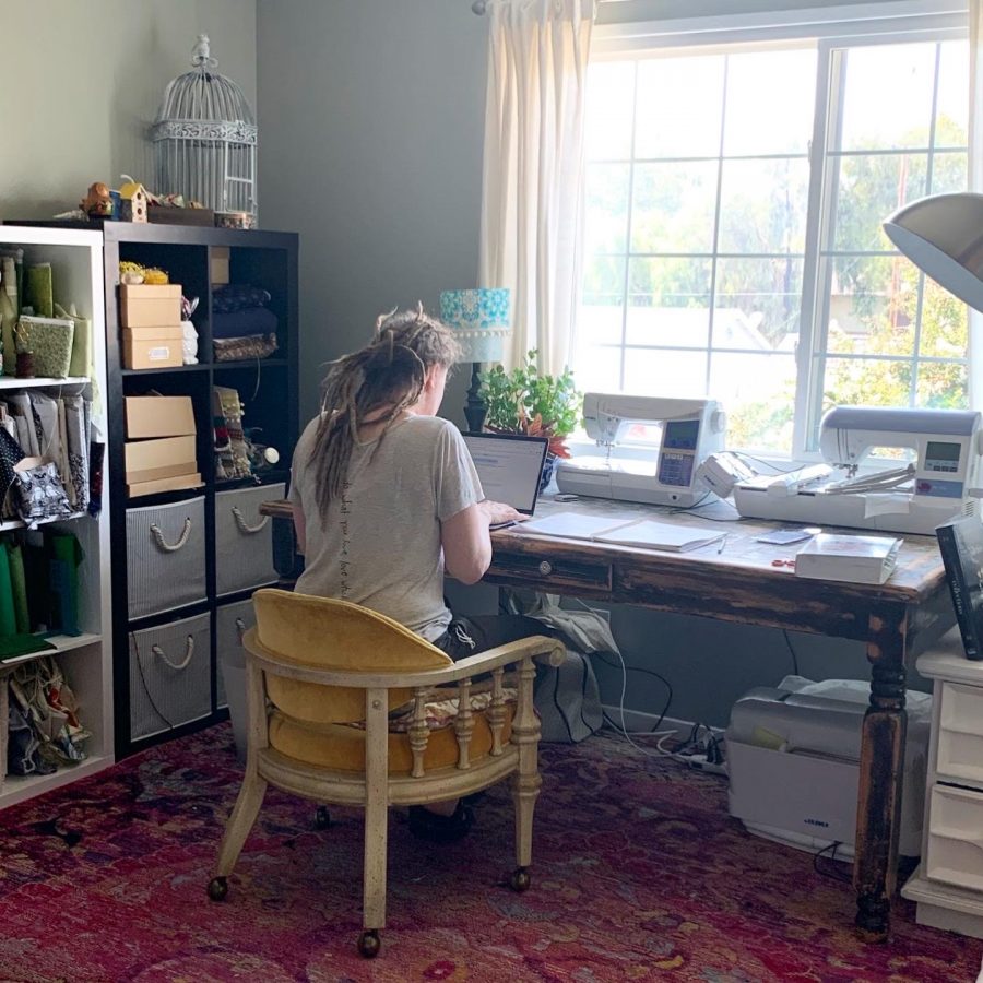Summer+Teal%2C+English+teacher%2C+refines+a+lesson+from+her+home.+Teal+is+one+of+many+teachers+at+BOHS+who+juggles+distance+teaching%2C+and+the+distance+learning+of+their+own+children.
