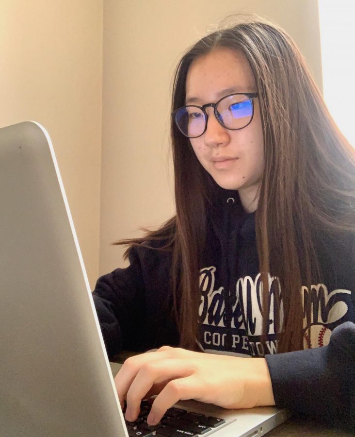 Karis Choi, sophomore, wears FEIYOLD blue light glasses during a Zoom session to protect her eyes from the blue light of her screen. 