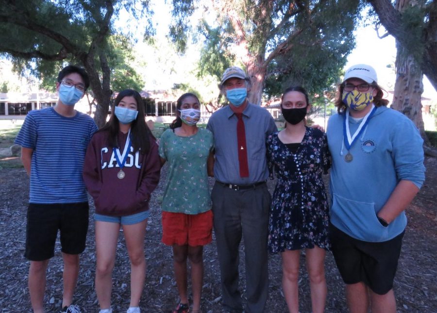 STEM SUMMER: Seniors Kyle Jung, Elin Jang, Rushika Guniganti, Jackie Peipkorn, and Owen Siglin pose with Boeing chemist, Eric Eichinger (center). The BOHS seniors met up with fellow Boeing interns at a Huntington Beach park for a final hangout to receive awards at the end of their Boeing internships. 