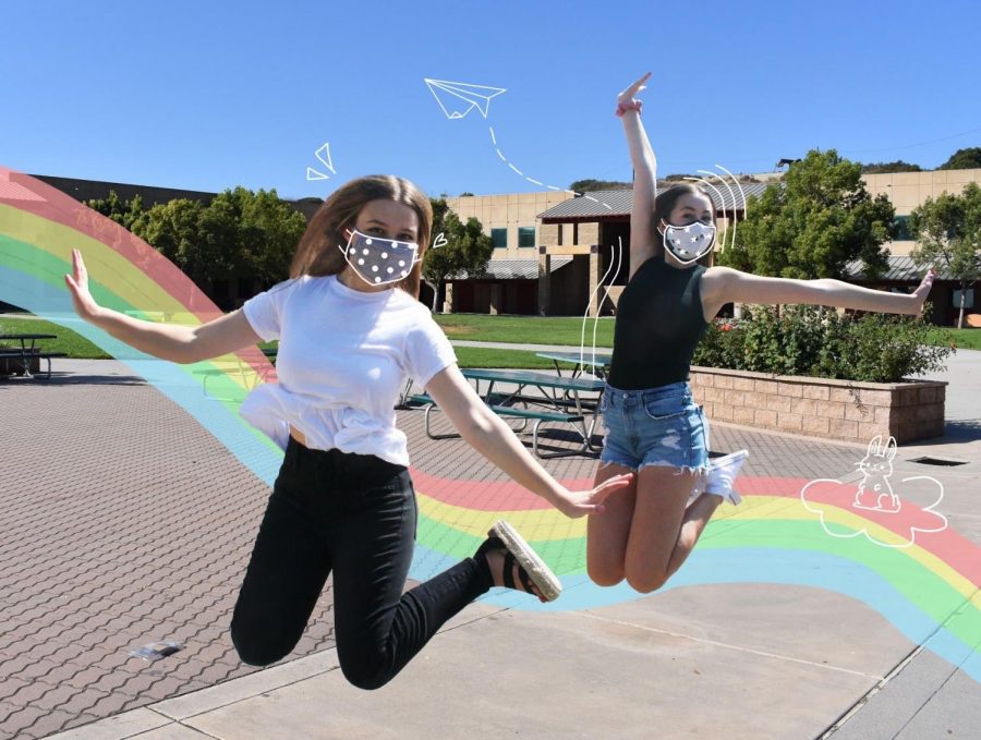 Wildcat editors Melea Altermatt and Katie Kudron jump for joy with their favorite masks by Joah Love and Yoga Society. 