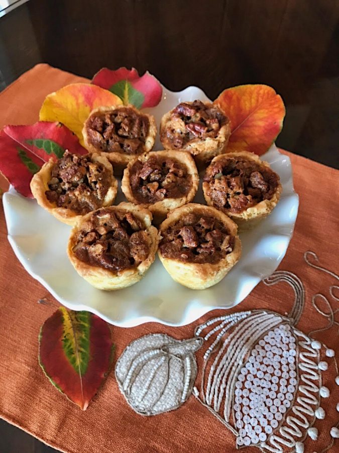 These mini pecan pies are easy to make, and will be a surefire hit at holiday family gatherings. 