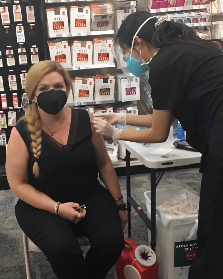 Verronica Clements, English teacher, receives her second dose of the Moderna vaccine on March 30 at a Brea CVS. “It was the best thing that ever happened to me in a CVS store,” Clements said.