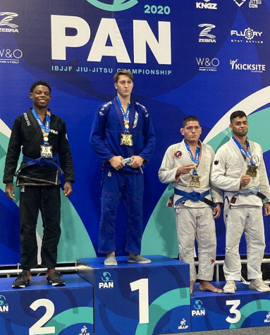 Nolan Stuart, senior, stands at the top of the podium at the 2018 International Brazilian Jiu-Jitsu Federation World Championships. Stuart graduates this week as a world champion BJJ athlete and four-year letter winner and captain of the Wildcats varsity wrestling team.