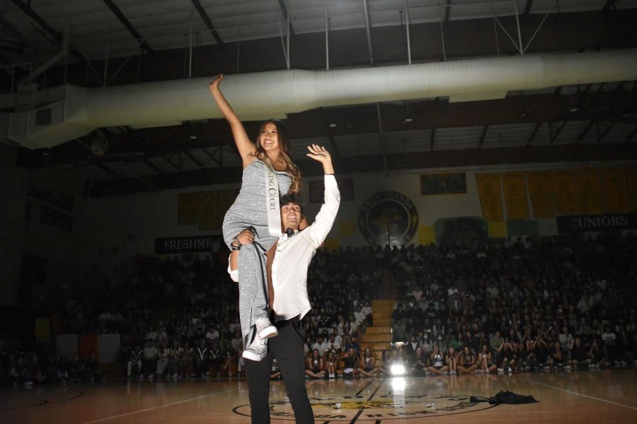 Homecoming queen nominee, Ashley Ochoa, performs a short dance with her escort, Jayden Muldown, senior. There were eight Homecoming court princesses who showcased a dance at the rally before the final vote for Homecoming queen.
