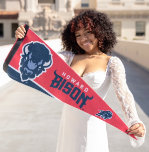 Senior Gaby Smith holds a pennant from Howard University, which she will attend in the fall. 