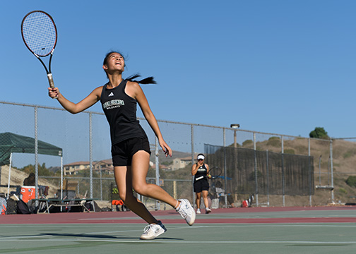 Senior Sydney Huang tracks a volley during an Oct. 10 match against El Dorado High School at BOHS. Varsity tennis improved their record from 3-13 in 22-23, to 10-12 this season.