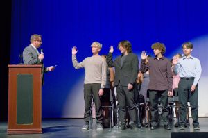 Dr. Joshua Porter, principal, leads the National Honor Society (NHS) pledge for new inductees. 44 new members were welcomed to NHS at the annual induction ceremony on Oct. 30.