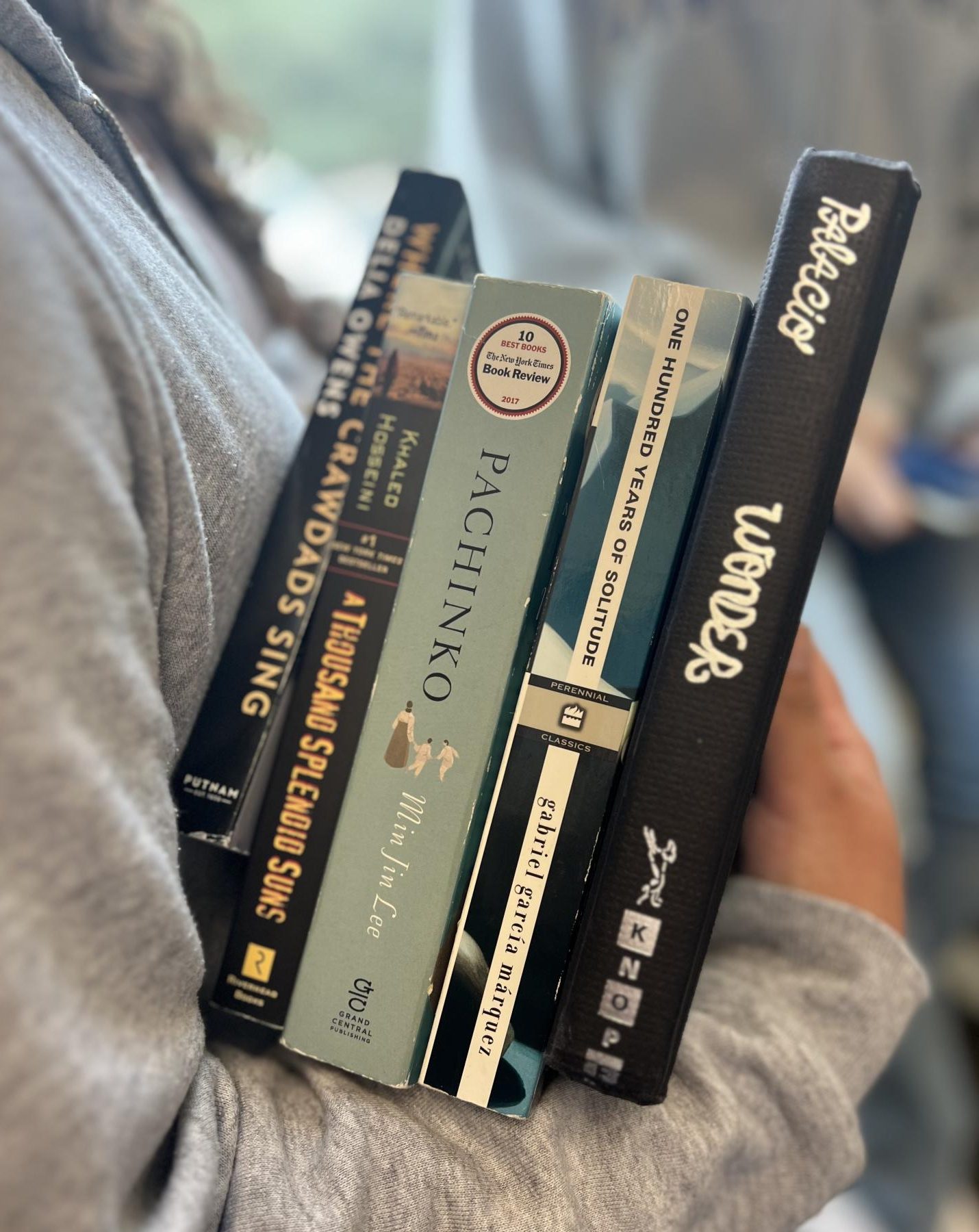 Wildcat staff writer Daisy Mora holds some of the Wildcat staffs favorite books. With genres spanning from historical fiction to magical realism to military history, theres something for everyone for the upcoming vacation days. 