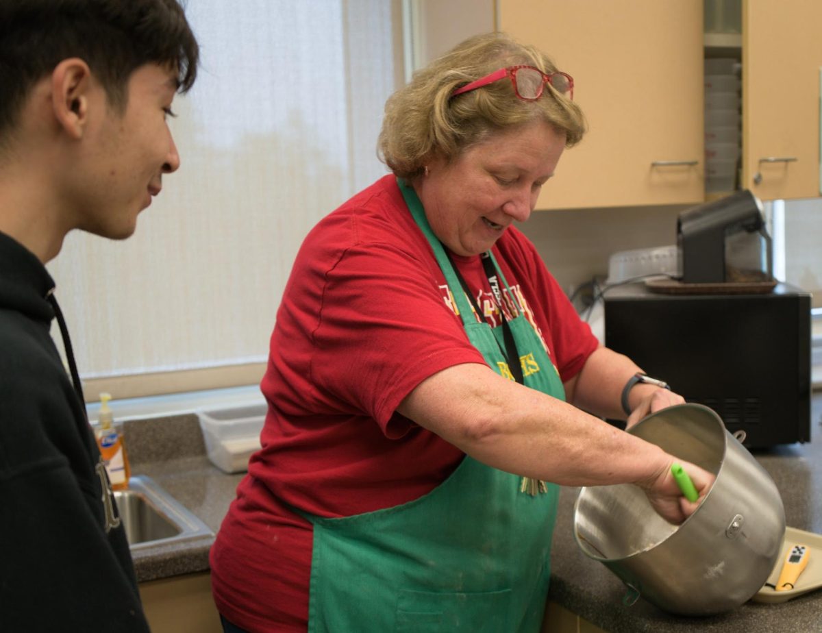 Culinary Arts teacher Janet Steinmetz prepares a dough that will be proofed and shaped into donuts during a Jan. 17 class. Steinmetz received the BOHS Teacher of the Year recognition, her second, on Jan 9.