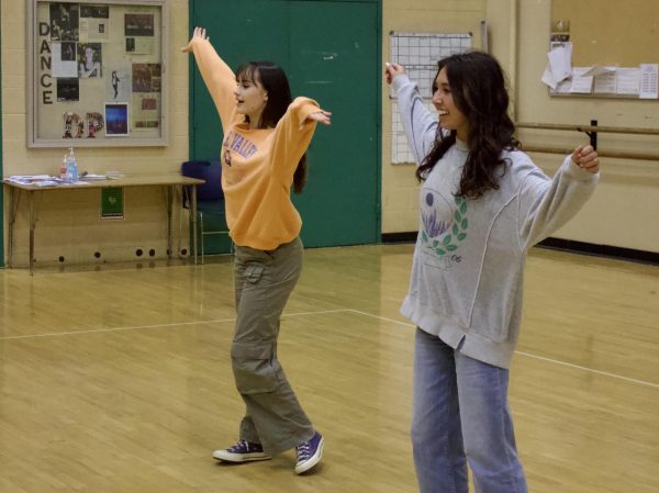 Emily Rodarte, sophomore and Dance Production member, and Laci Armenta, senior, rehearse for Fridays Dancing With the Cats competition.