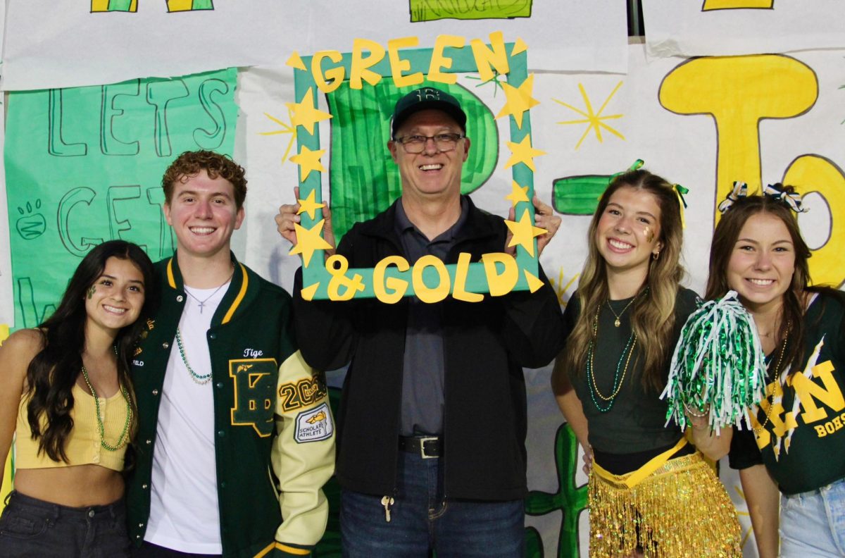 Davis with BOHS students in front of The Den at the varsity football home-opener on Aug. 30.  