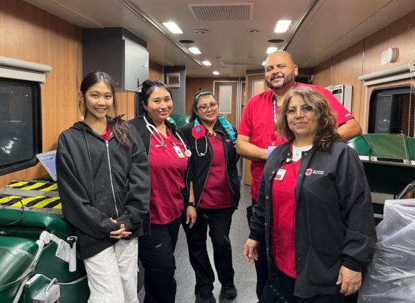 Red Cross Club co-president Lauren Ko with American Red Cross nurses in a Red Cross "bloodmobile" on March 13. The club will host a blood drive at Brea United Methodist Church on Oct. 9