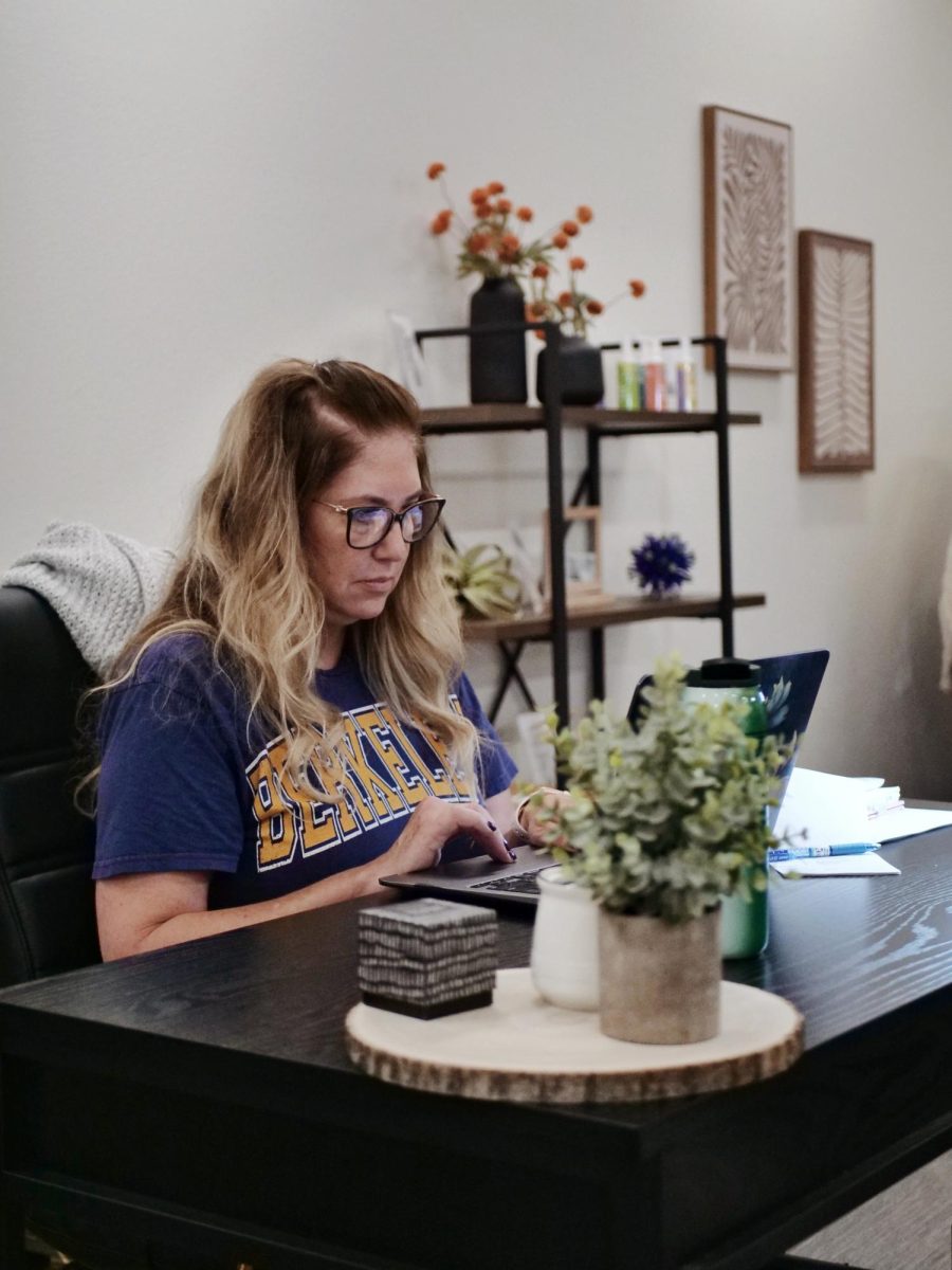 Jennifer Cormier, guidance counselor, staffs the PAWS WellSpace room on Oct. 23. The space, adjacent to the library in room 200, officially opened to student and staff use this week.