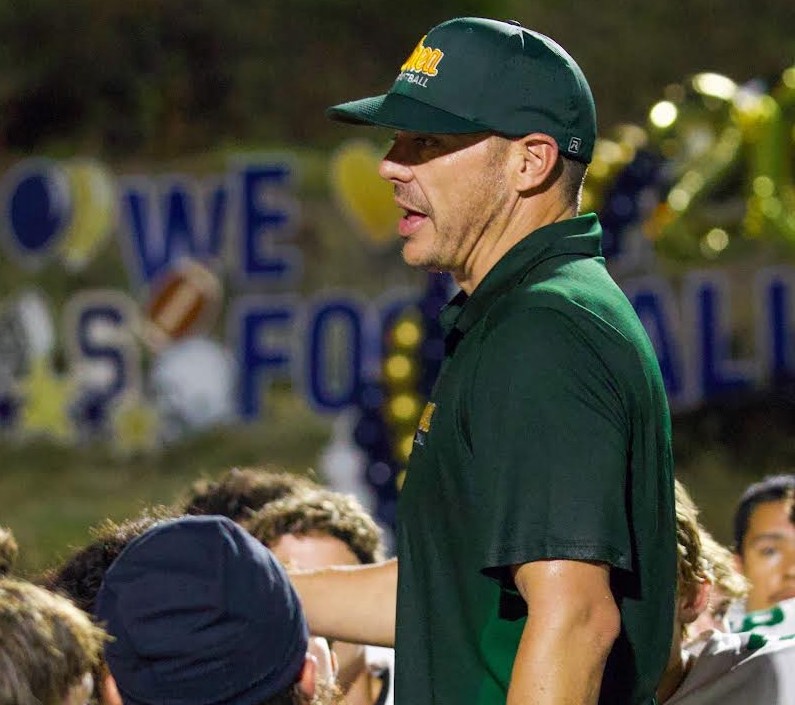 Head varsity football coach Justin Villasenor addresses his team during a 2024 game. The first-year varsity head coach received more than 4,500 votes to win the week eight Coach of the Week competition sponsored by the Los Angeles Chargers. 