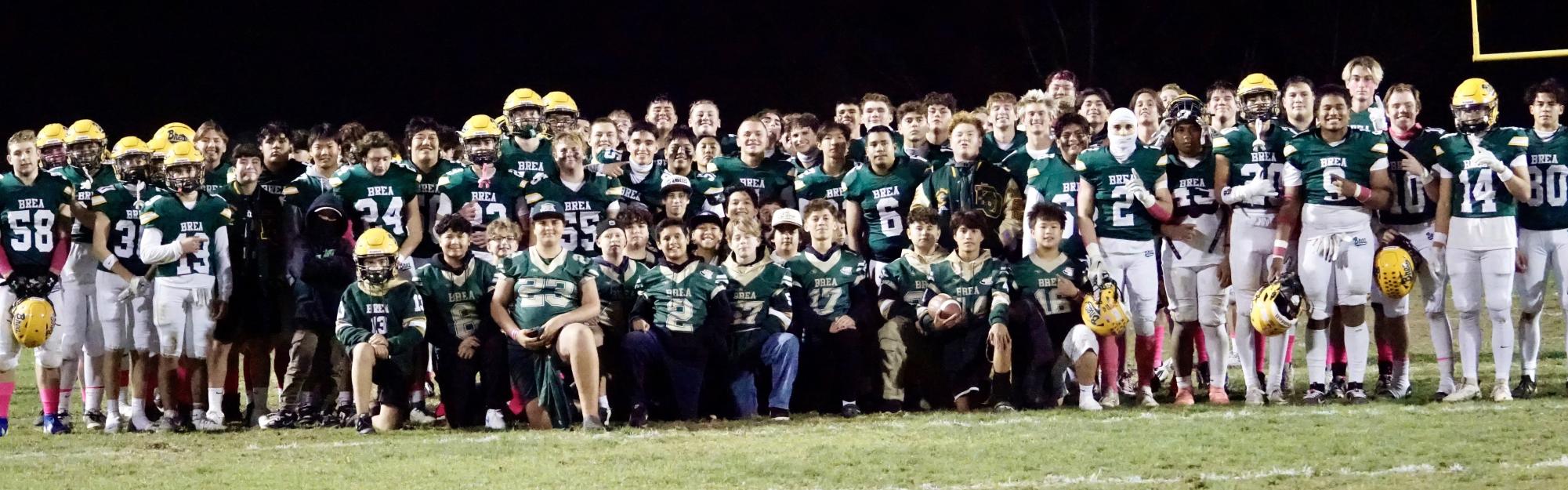 Wildcats varsity football with members of Brea's Pop Warner teams after a home game against Garden Grove High School in Oct. 18. (Courtesy of Julie Marquez)