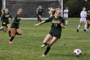 Varsity striker Peyton Dunbar (‘25) controls the ball during a Dec. 10 contest against Diamond Bar High School. The Wildcats beat the Brahmas 3-2 behind Dunbar's two goals and assist. (Courtesy of Airan Jansen)