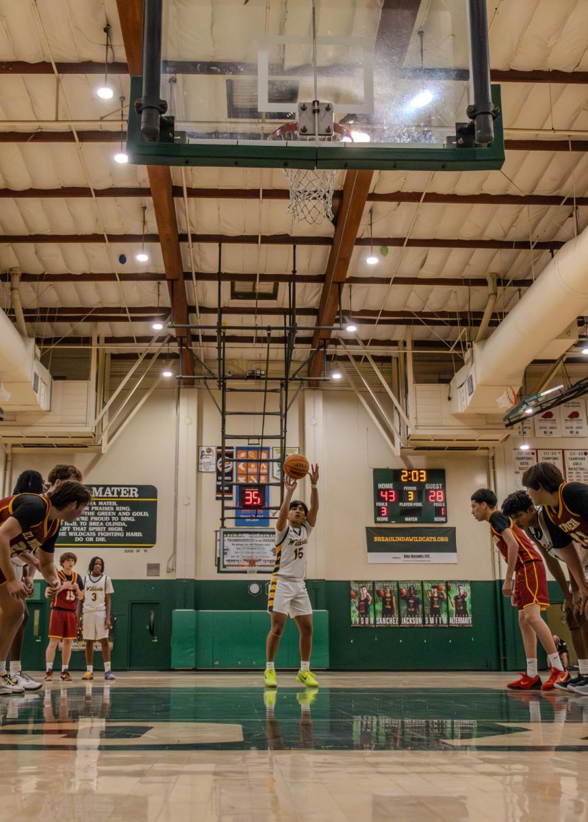 Tayag shoots a third-quarter free throw. The Wildcats were 17 for 24 from the line during the game.