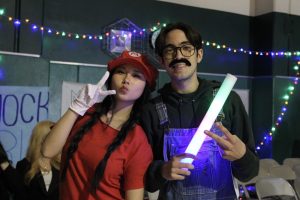 Elise Chu ('25) as Mario and William Stelmar ('25) as Luigi at the Mario Kart-themed winter rally. 