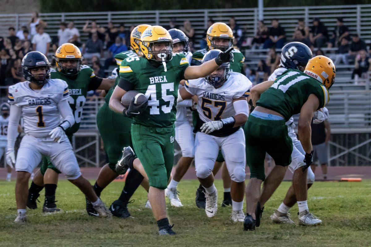 Running back Kolotolu Liti (‘26) rumbles into the end zone for one his two touchdowns against the visiting Sonora Raiders. The 47-0 victory was the Wildcats’ eleventh regular season win in a row.