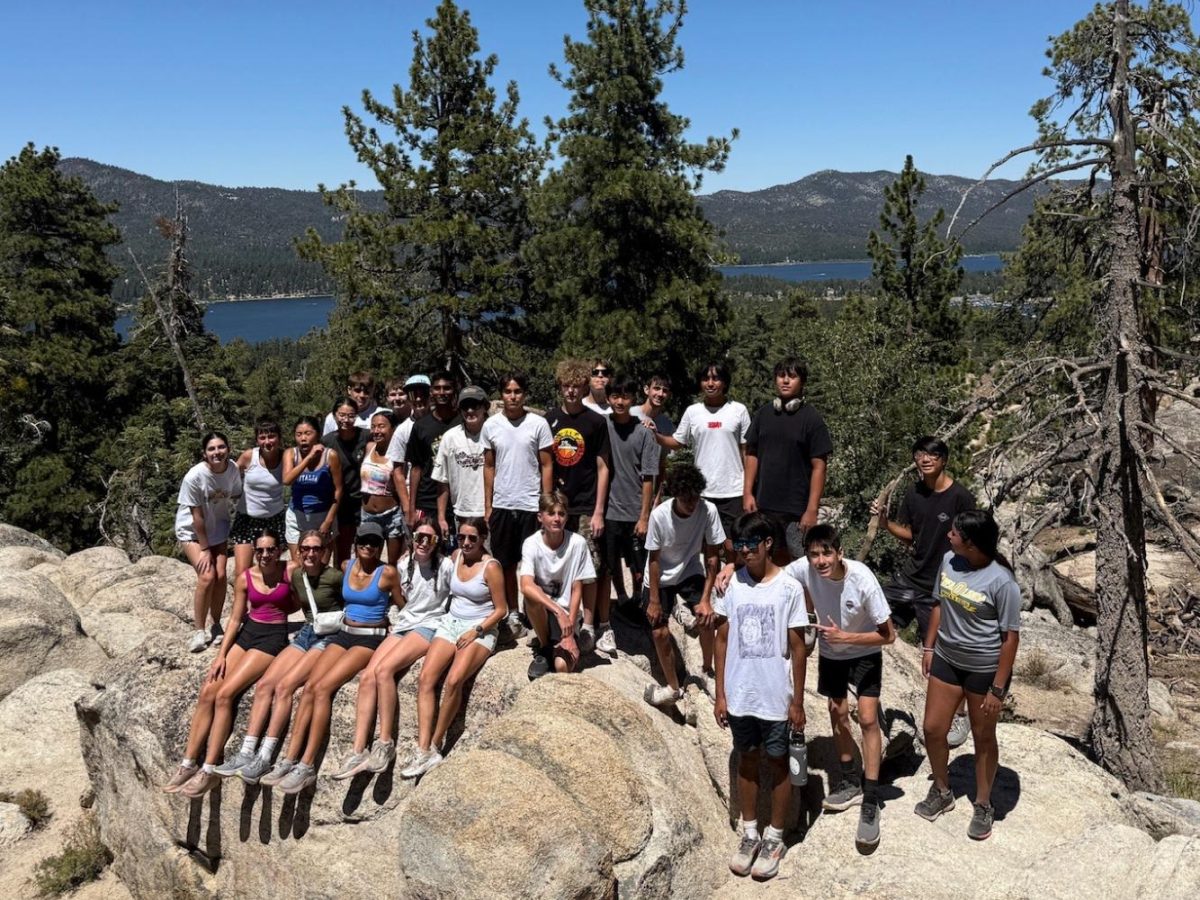 The Wildcat boys' and girls' cross country teams take a break from training. Each summer, the Wildcat cross country programs travel to Big Bear for high-altitude training and team bonding. 
