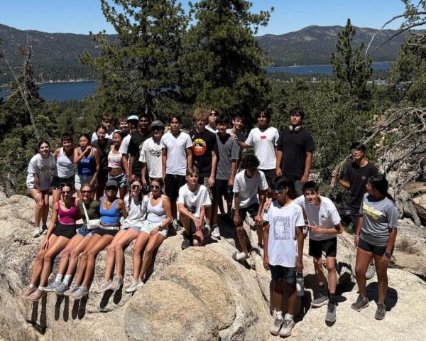 The Wildcat boys' and girls' cross country teams take a break from training. Each summer, the Wildcat cross country programs travel to Big Bear for high-altitude training and team bonding. 