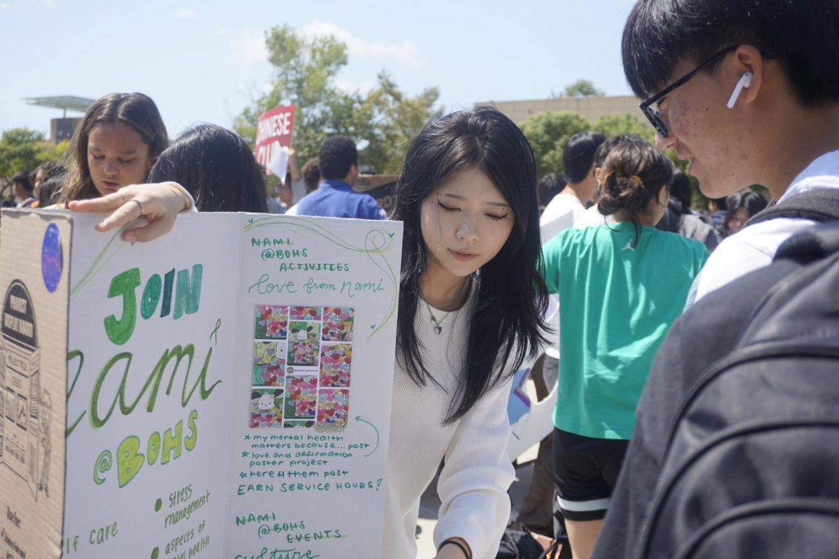 Siel Lee ('26) promotes her club, National Alliance of Mental Illness (NAMI) Sept. 10.