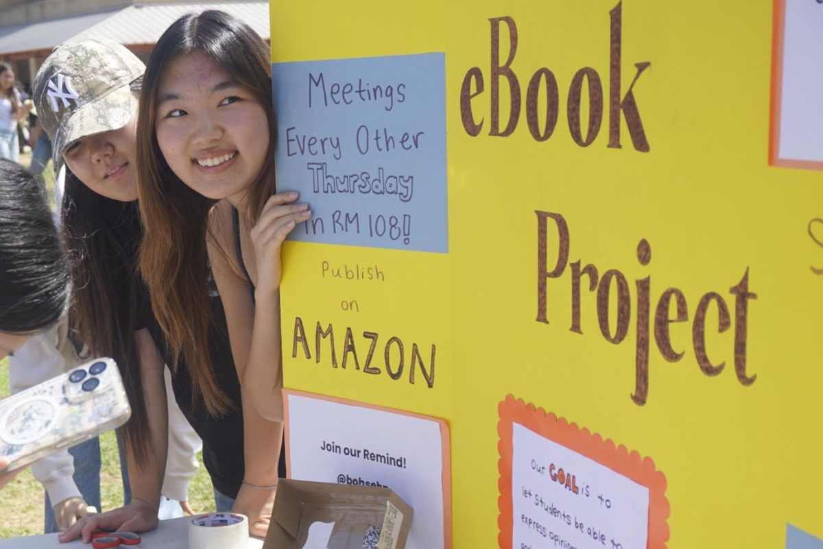 Katie Chao ('27) promotes her club, eBook Project, during Club Rush in the quad Sept. 10.