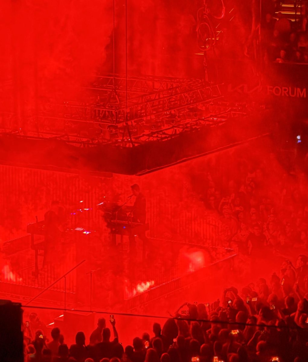Reznor, awash in red, performs “Gave Up,” from the 1992 movie 'Broken'. 