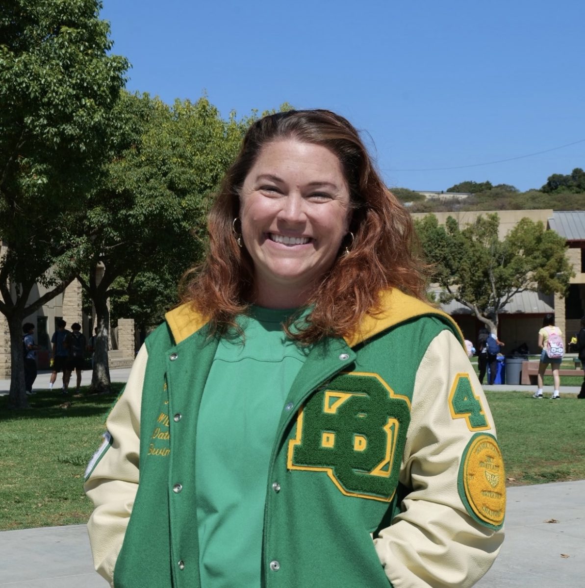Culinary Arts teacher Marcy Hail,  BOHS Class of 2001, and and her varsity letters for water polo and swim. 