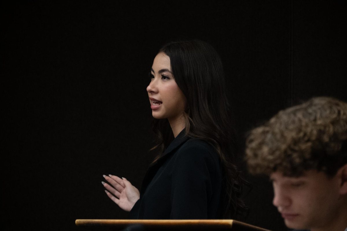 Hammel presents the opening statement on behalf of BOHS's prosecution team, explaining the People’s argument – the defendant’s guilt of first-degree murder through poisoning due to a decades-long feud – to the judge.