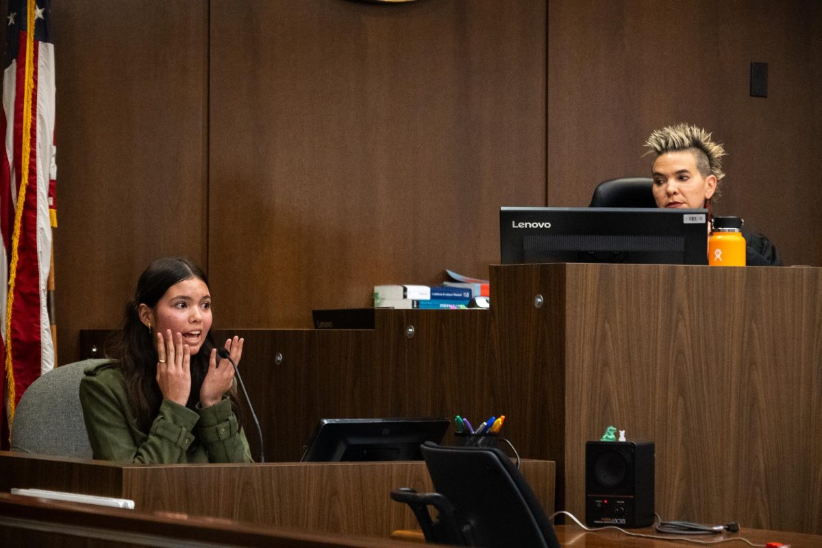 Witnesses play an essential role in presenting evidence, such as a motive or alibi, through firsthand accounts of the event. Mock Trial member Dara Aung-Pfingsten ('29) testifies that she, as witness Imari Rodriguez, saw the defendant’s face turn “bright red” after being slapped by the deceased victim of the crime.  Aung-Pfingsten's performance earned her the Most Valuable Player (MVP) award on Nov. 20.