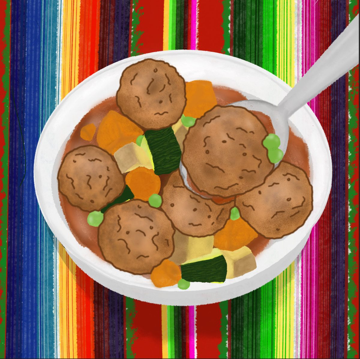 Albondigas, a Mexican soup with meatballs and vegetables, atop a traditional tablecloth. The meal is served annually in writer Sofia Rodriguez's ('26) household.