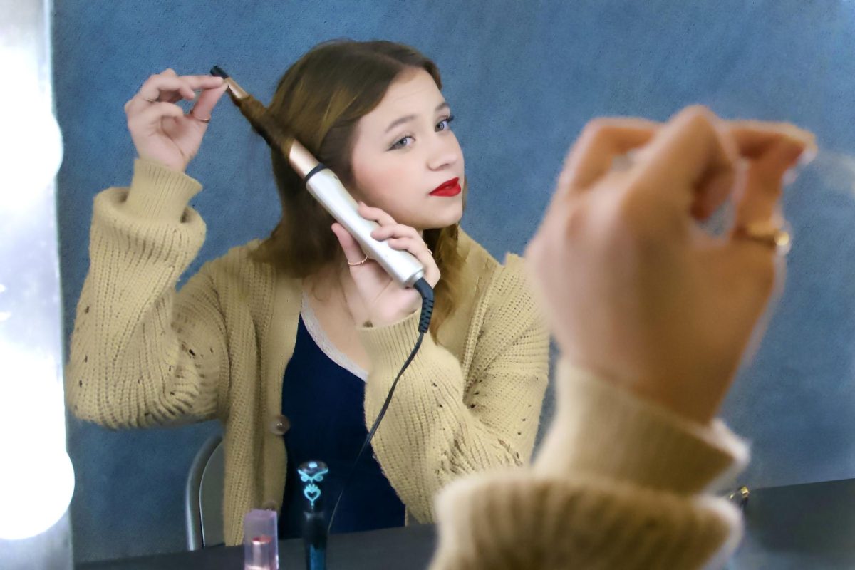 A scene familiar to Sienna Rodriguez ('26) and her performing arts peers: preparing for a production. Rodriguez performs in three choirs, theater, and contributes behind-the-scenes in Tech Crew. 