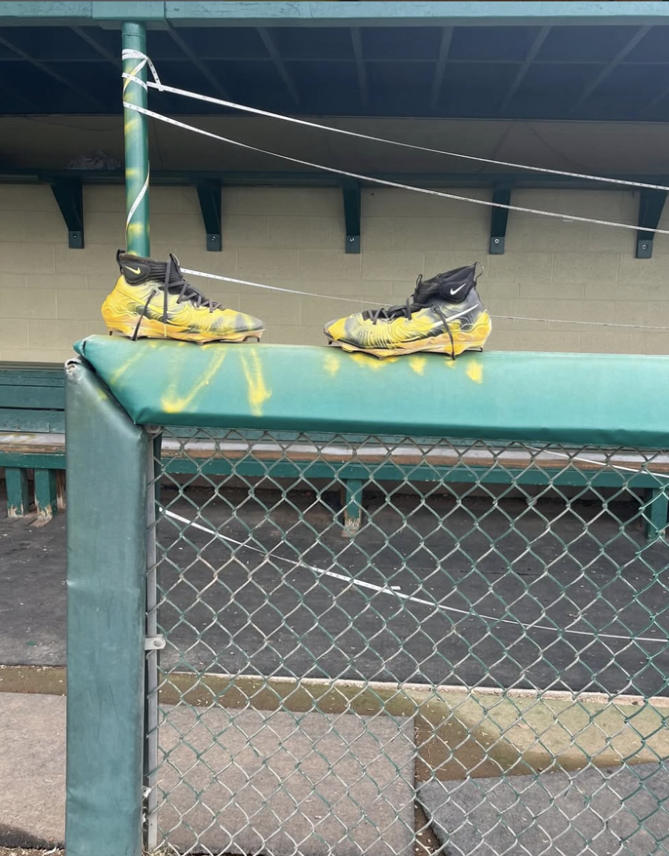 A pair of spray painted cleats, left at the Wildcats' baseball field in an act of vandalism that included spray-painted profanity on dugout walls and doors, profanity etched into the infield dirt, a torn vinyl “Brea Olinda Baseball” sign in the outfield, a destroyed water fountain, and a damaged pitcher’s mound.