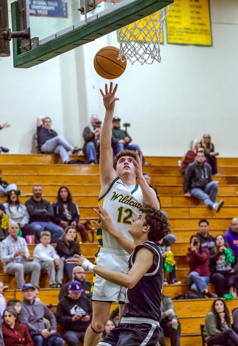 Severson rises over a Pacifica defender for two of his 11 points. 