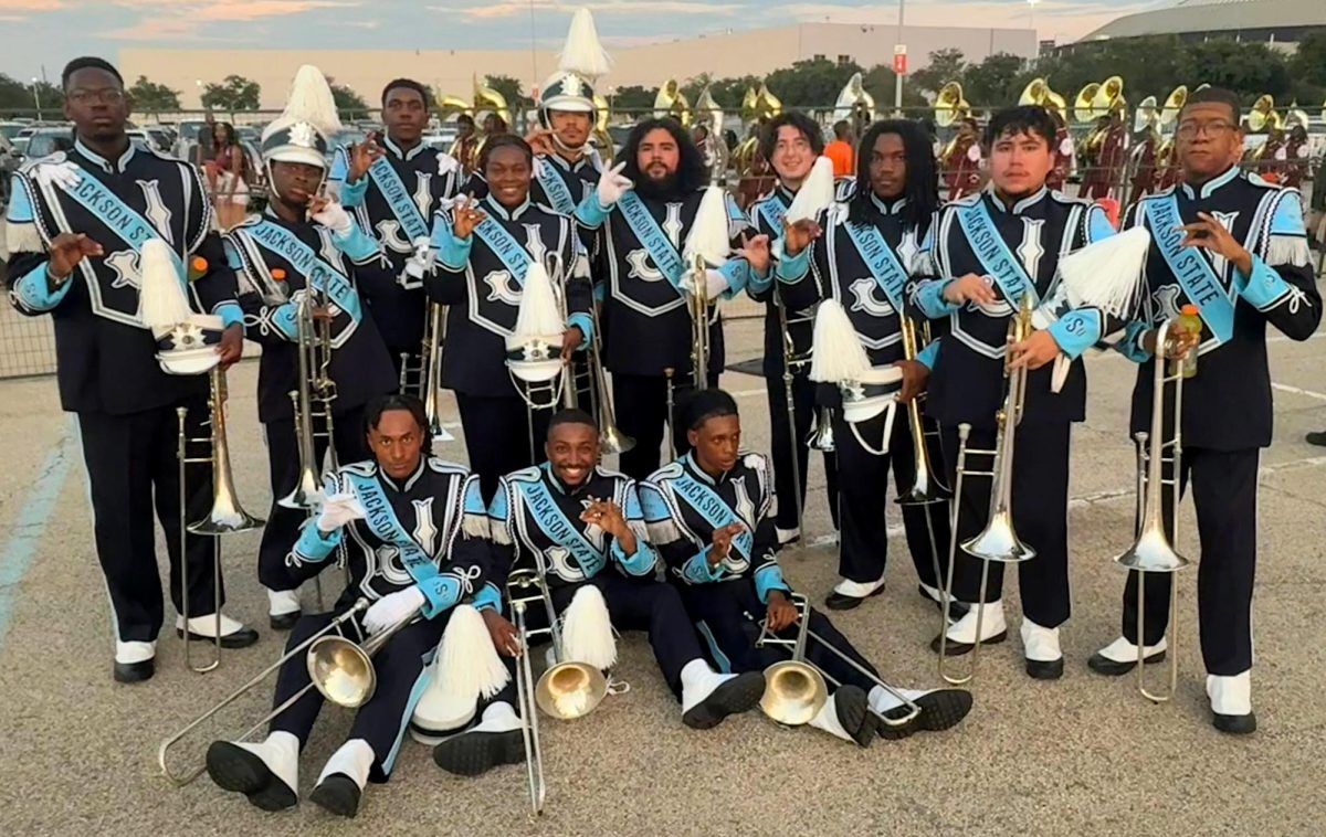 Members of the Sonic Boom of the South marching band on game day. Sanchez is top row, fourth from the right. (Courtesy of Kimberly Gilreath)