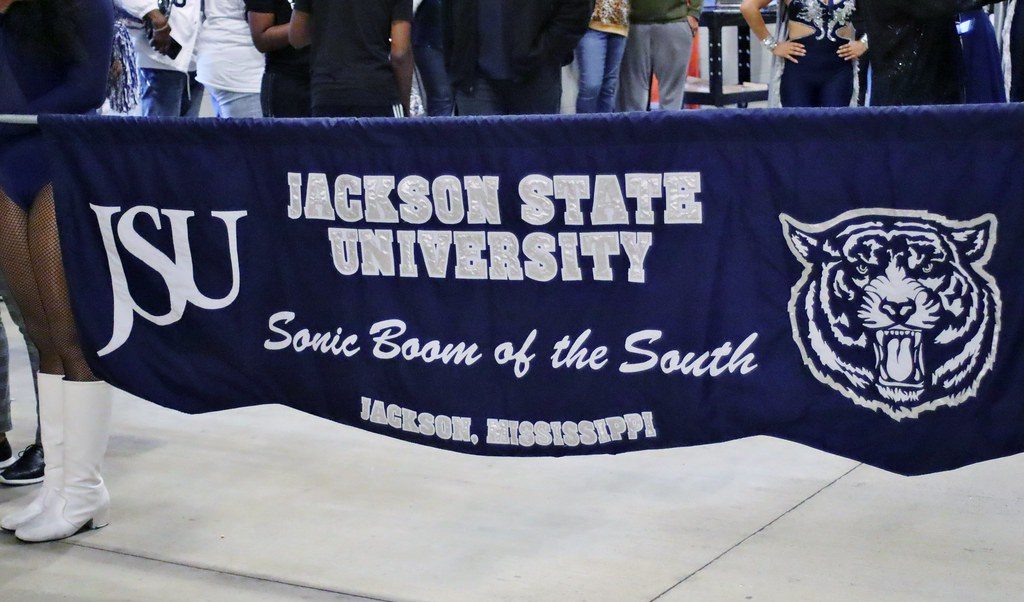 A parade banner for JSU's band, the Sonic Boom of the South. (“Sonic Boom of the South Marching Band” licensed under CC-BY-SA-2.0)