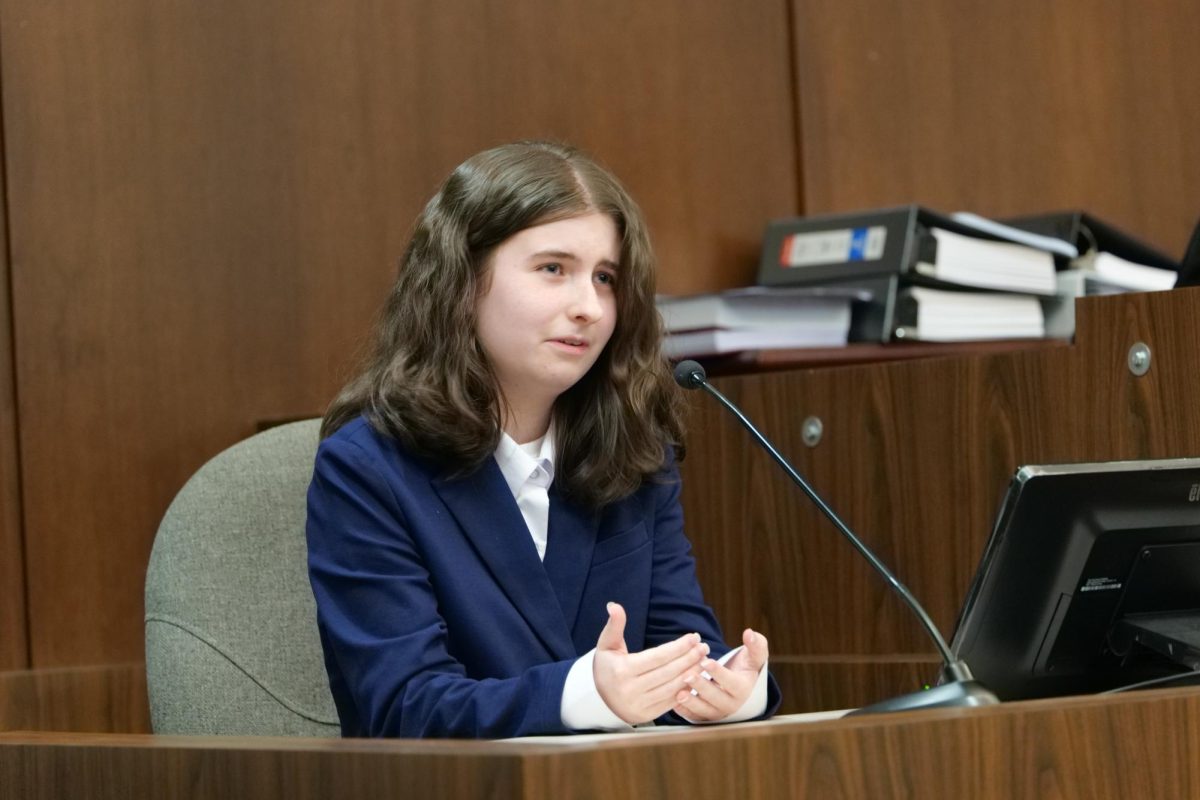 Kaitlyn Skiles ('27) testifies at the witness stand as the defendant Haley Fromholz, who is accused of first degree murder by poisoning, Dec. 4.