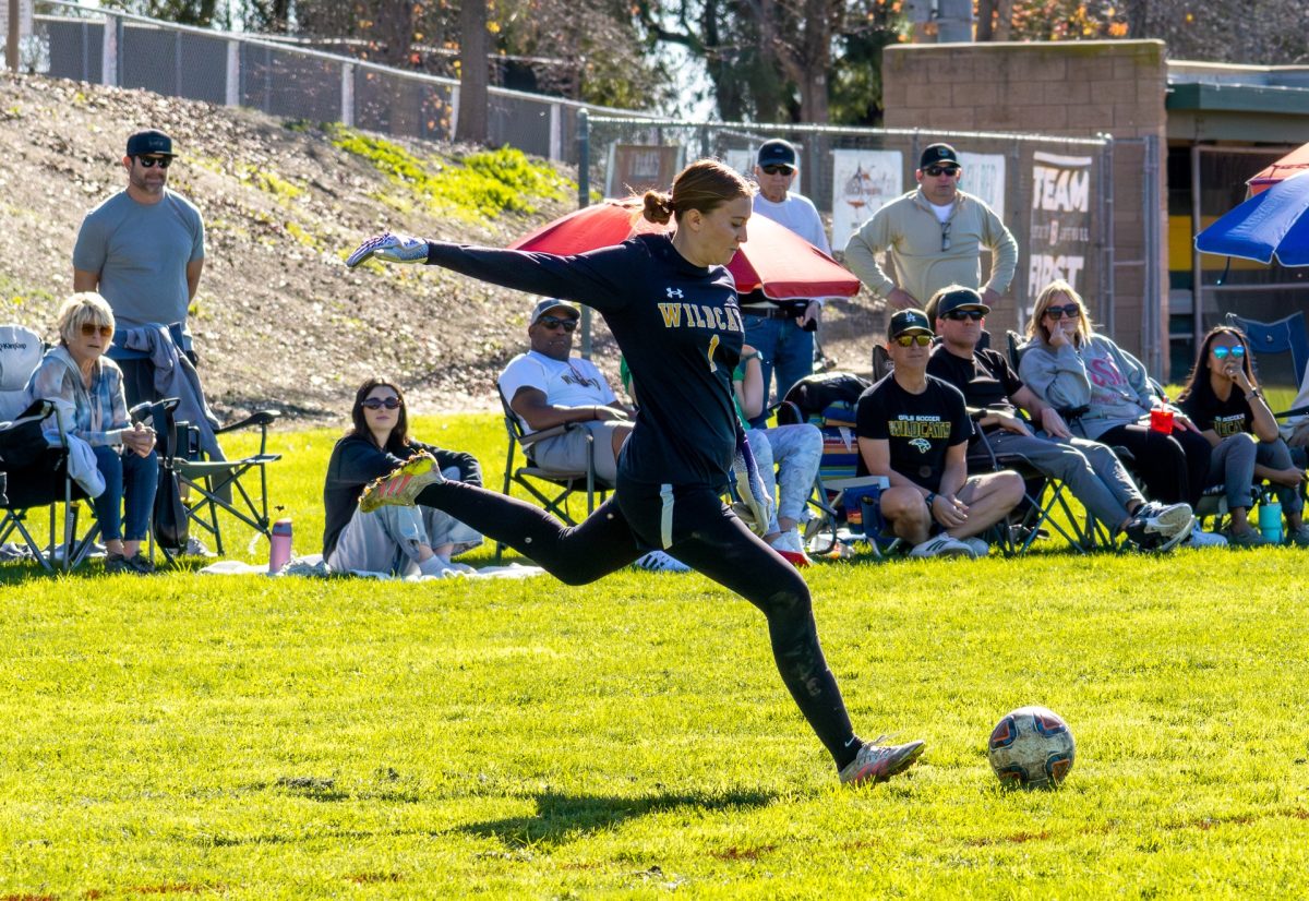 Gen Dauphin ('26) take a free kick during a Jan. 10 contest against El Modena High School.