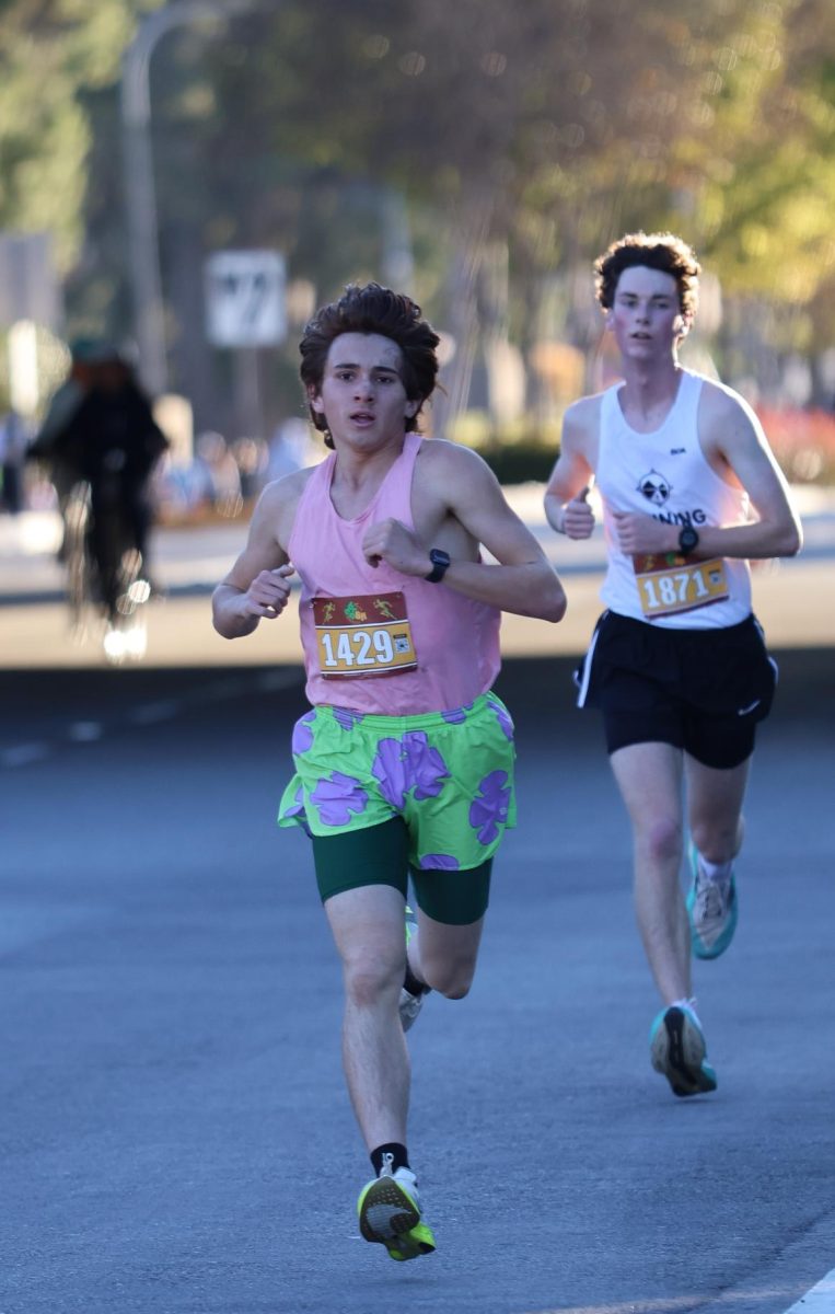 BOHS cross country runner Toby Cervantes (‘28) sprints the final 500 meters to the finish line. The sophomore placed 35th out of 1768 runners. 
