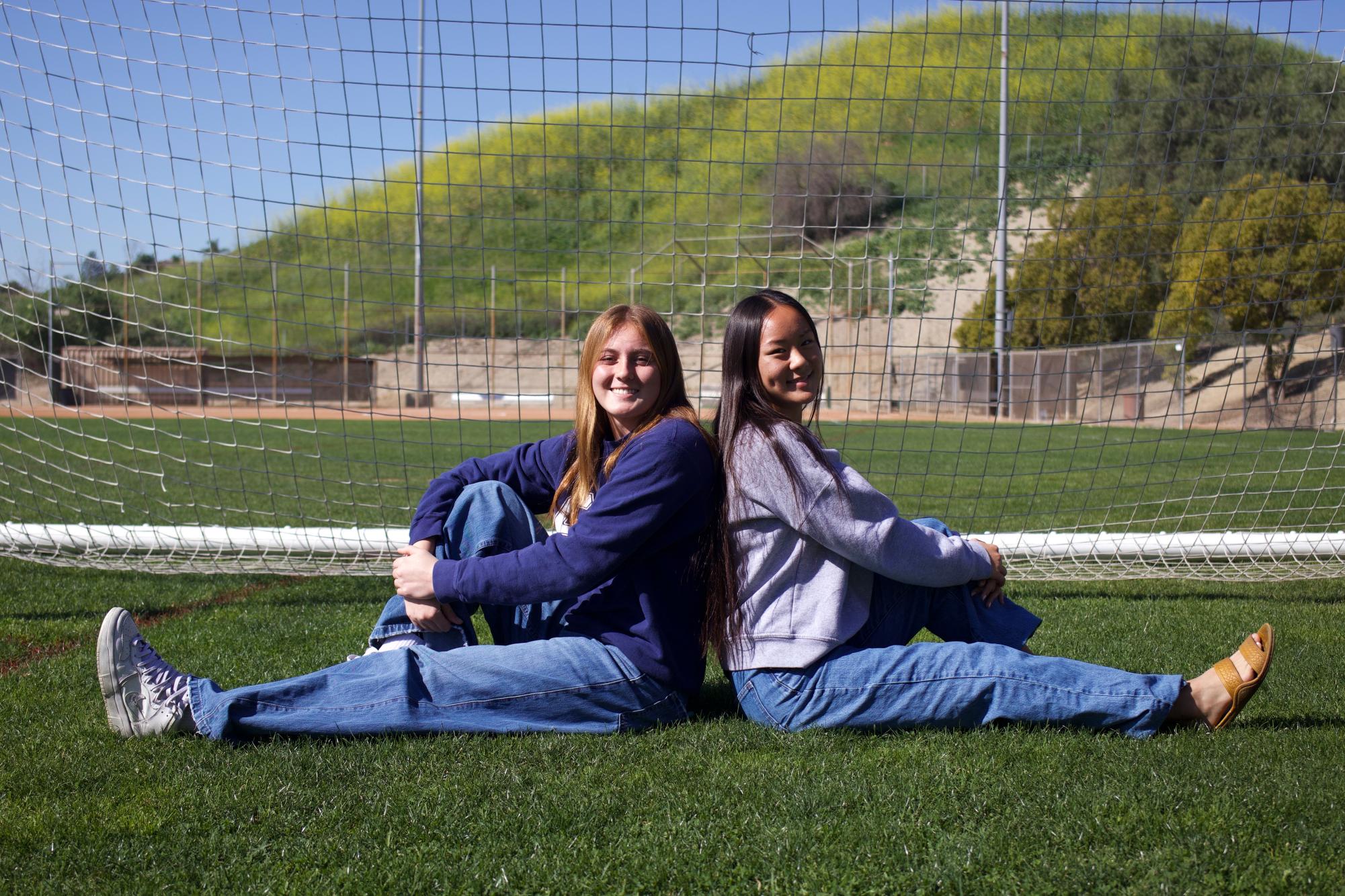 Seniors Gen Dauphin and Lizzie Choi in Wildcat Stadium, where the pair have competed together on varsity soccer for four years. The duo will take their talents to NCAA Division 1 California Baptist University in the fall. 