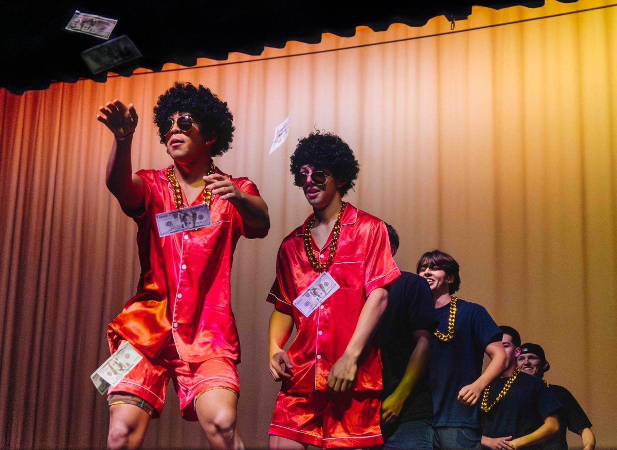 Mr. Brea contestants Matthew Cosylion ('26) and Hudson Sims ('26) perform choreography o "24K Magic" by Bruno Mars during the talent segment of the Mr. Brea contest Feb. 19. (Courtesy of Jill Matyuch)