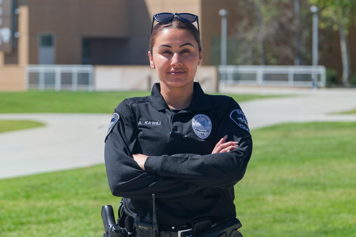 Officer Anahi Kawili photographed in the Brea Olinda High School quad. The School Resource Officer rotates between the district's nine schools.