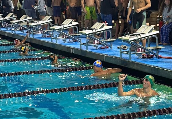 Kyle Franks ('26) celebrates his third place finish in the 100-meter backstroke with a time of 50.82 for CIF-SS finals at Mt. SAC May 8. Franks broke his own school record by .04 seconds and qualified to compete in the CIF State Championships.